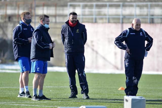 Romania's coaching team, from left: Analyst Paul Larter, forwards coach Steve Scott, backs coach Sosene Anesi and head coach Andy Robinson.