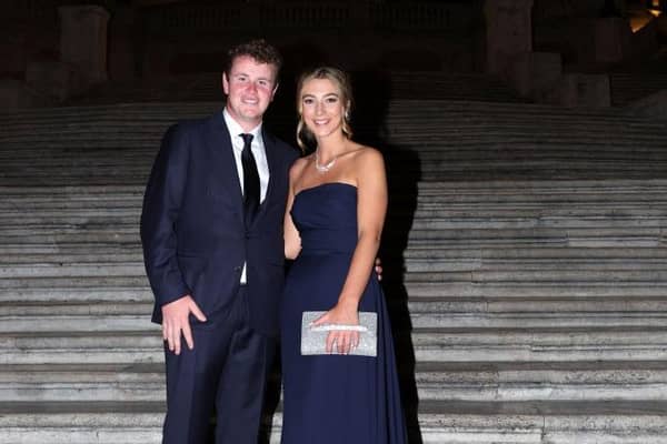 Team Europe's Bob MacIntyre and girlfriend Shannon Hartley pose at the Spanish Steps prior to the 2023 Ryder Cup at Marco Simone Golf Club in Rome. Picture: Andrew Redington/Getty Images.