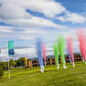 Young people from St Paul’s Youth Forum hit tee shots from a 52-bay double-decker driving range to mark the launch of Golf It! in Glasgow.