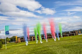 Young people from St Paul’s Youth Forum hit tee shots from a 52-bay double-decker driving range to mark the launch of Golf It! in Glasgow.