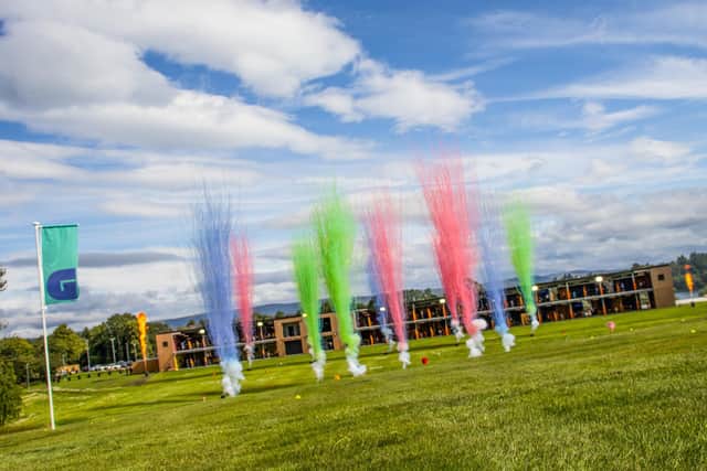 Young people from St Paul’s Youth Forum hit tee shots from a 52-bay double-decker driving range to mark the launch of Golf It! in Glasgow.
