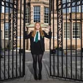 Hannah Douglas-Walker at the gates built by her great-grandfather.