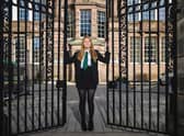 Hannah Douglas-Walker at the gates built by her great-grandfather.