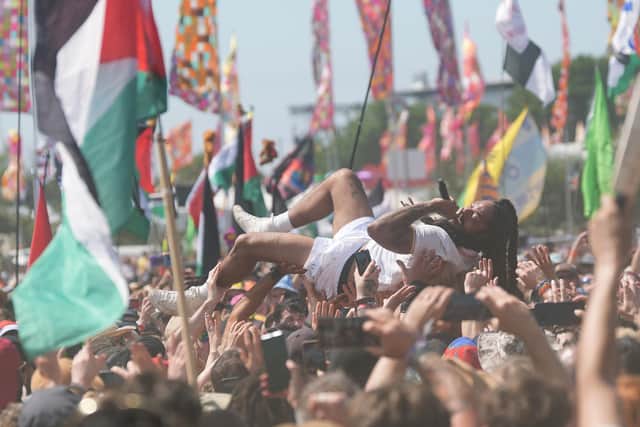 Bob Vylan singer Bobby Vylan - real name Pascal Robinson-Foster - crowd surfs during his performance at the Glastonbury Festival at Worthy Farm in Somerset. The performer led crowds in chants of 'death, death to the IDF' (Picture: Yui Mok/PA Wire)