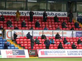 Fans look on from socially distanced positions in the stands during the Ladbrokes Scottish Premiership match between Ross County and Celtic at Global Energy Stadium on September. (Pic: Getty Images)