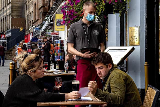 Patrons at a bar in Edinburgh. Picture: Lisa Ferguson