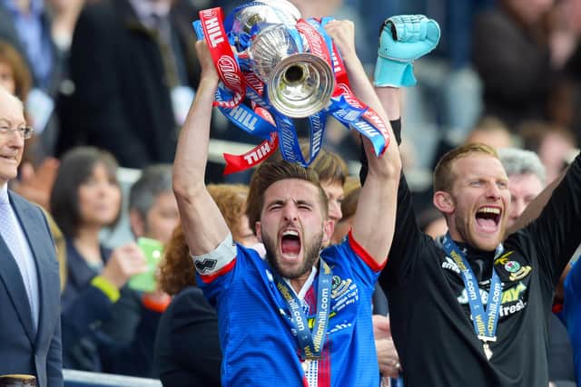 Graeme Shinnie lifts the Scottish Cup as captain of Inverness in 2015.
