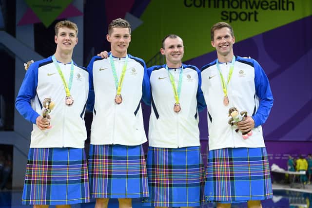 Bronze medalists, Craig McNally, Ross Murdoch, Duncan Scott and Evan Jones of Team Scotland after the Men's 4 x 100m Medley Relay Final. (Photo by Quinn Rooney/Getty Images)