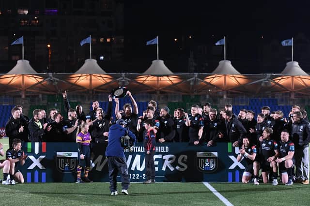 Glasgow Warriors lift the Scottish-Italian shield during a BKT United Rugby Championship against Connacht.