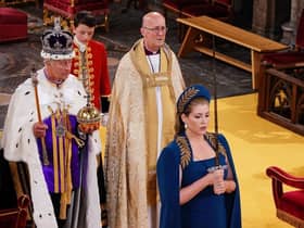 Lord President of the Council, Penny Mordaunt, holding the Sword of State walking ahead of King Charles III during the coronation. Picture: Yui Mok - WPA Pool/Getty Images