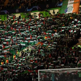 Celtic fans hold up Palestine flags during their club's 2-2 draw with Atletico Madrid in the  Champions League. (Photo by Craig Foy / SNS Group)