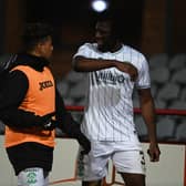 Hibs defender Rocky Bushiri walks off after being shown a red card in the goalless draw with Dundee.  (Photo by Paul Devlin / SNS Group)