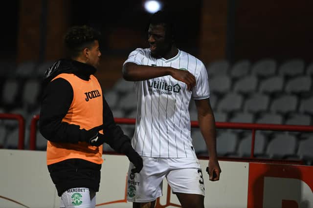 Hibs defender Rocky Bushiri walks off after being shown a red card in the goalless draw with Dundee.  (Photo by Paul Devlin / SNS Group)