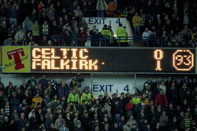 The Ibrox scoreboard details the 1997 Scottish Cup semi-final replay result that marked the end of Tommy Burns three years in charge of Celtic. (Photo by SNS).
