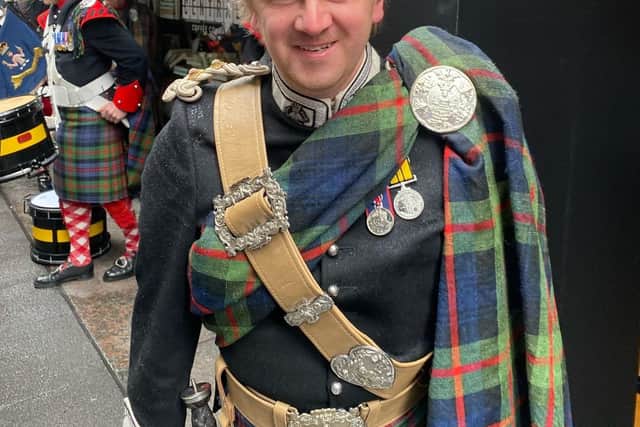 An Atholl Highlander enjoys the parade