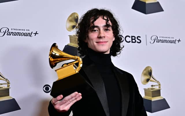 Glaswegian music producer and songwriter Blair Ferguson, who is also known as BLK Beats, poses with the Grammy for Best R&B Song for 'Snooze' by Snooze. Picture: Frederic J. Brown/AFP