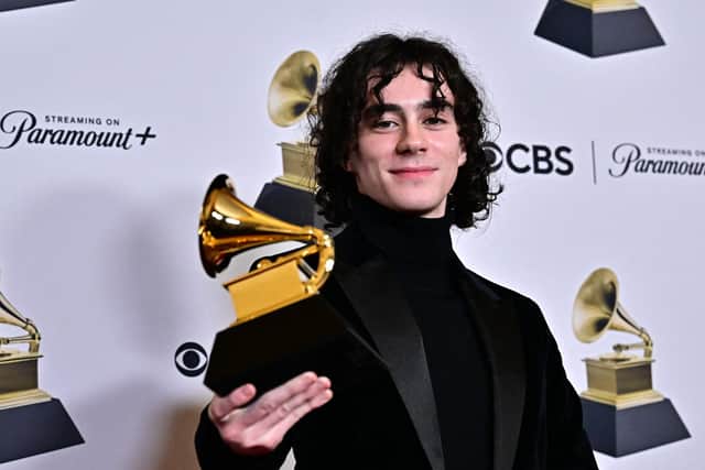 Glaswegian music producer and songwriter Blair Ferguson, who is also known as BLK Beats, poses with the Grammy for Best R&B Song for 'Snooze' by Snooze. Picture: Frederic J. Brown/AFP