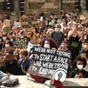 Protesters gather in support of the Black Lives Matter and Black Voices Matter movements in central Leeds on June 14, 2020 in the aftermath of the death of unarmed black man George Floyd in police custody in the US. (Photo by OLI SCARFF/AFP via Getty Images)