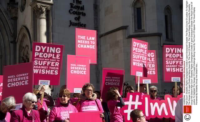 Mandatory Credit: Photo by Roland Hoskins/ANL/Shutterstock (10285254a)
High Court- Disability Rights Campaigners Create A 'giant Graveyard' Outside The Royal Courts Of Justice To Highlight The Danger Of A Legal Challenge Being Heard By The Court Of Appeal. The Visual Display Pioneered By Disability Group 'the Distant Voices' Will Appear Shortly Before Noel Conway's Pro Assisted Dying Legal Challenge At The Court And Is Supported By A Protest Outside. Pictured Supporters Of Noel Conway.
High Court- Disability Rights Campaigners Create A 'giant Graveyard' Outside The Royal Courts Of Justice To Highlight The Danger Of A Legal Challenge Being Heard By The Court Of Appeal. The Visual Display Pioneered By Disability Group 'the Distant