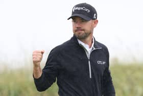 Brian Harman celebrates after holing a long birdie putt on the 14th green in the final round of the 151st Open at Royal Liverpool. Picture: Warren Little/Getty Images.