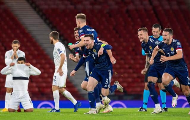 GLASGOW, SCOTLAND - OCTOBER 08: Scotland's players celebrate winning the shoot out during a Euro 2020 Play off match between Scotland and Israel at Hampden Park, on October 08 2020, in Glasgow, Scotland (Photo by Alan Harvey / SNS Group)