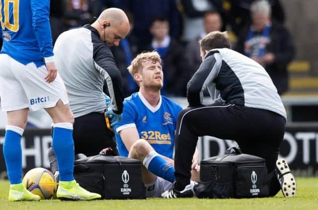 Rangers defender Filip Helander is treated for an injury before being substituted at the end of the first half of the Premiership win over St Mirren in Paisley on Sunday. (Photo by Craig Williamson / SNS Group)