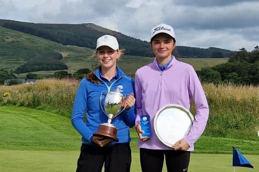 New Scottish Girls' champion Evie McCallum (Dunfermline) and net winner Ellie Bent (Gullane) show off their trophies at Cardrona. Picture: Scottish Golf