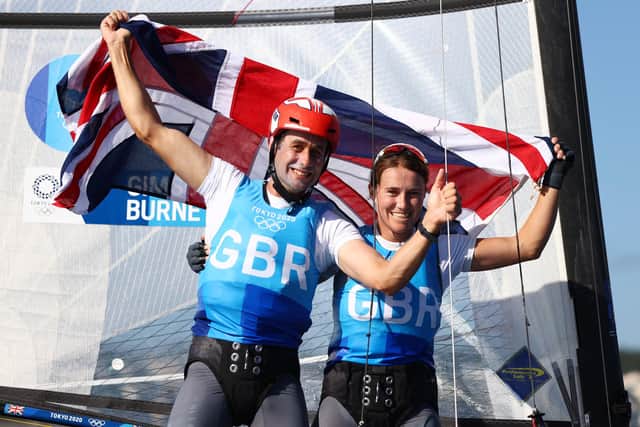 Anna Burnet and John Gimson celebrate finishing second in the Nacra 17 Foiling class. Picture: Clive Mason/Getty Images