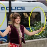 A protestor juggles hula hoops at an Extinction Rebellion protest in Parliament Square, London, on Friday, as part of 10 days of protests. Pic: PA