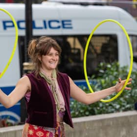 A protestor juggles hula hoops at an Extinction Rebellion protest in Parliament Square, London, on Friday, as part of 10 days of protests. Pic: PA