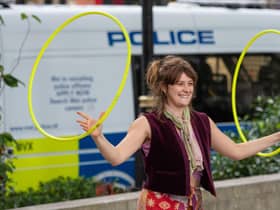 A protestor juggles hula hoops at an Extinction Rebellion protest in Parliament Square, London, on Friday, as part of 10 days of protests. Pic: PA