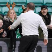Celtic manager Ange Postecoglou gives a young fan his jumper after the 4-1 win over St Johnstone. (Photo by Craig Williamson / SNS Group)