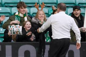 Celtic manager Ange Postecoglou gives a young fan his jumper after the 4-1 win over St Johnstone. (Photo by Craig Williamson / SNS Group)