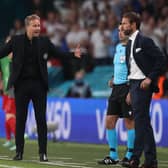 Denmark manager Kasper Hjulmand reacts during his side's controversial 2-1 extra-time defeat against England (Photo by CARL RECINE/POOL/AFP via Getty Images)