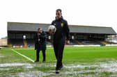 Referee Don Robertson calls the Dundee-Rangers match off during a secondary pitch inspection at Dens Park (Picture: Ewan Bootman/SNS Group)