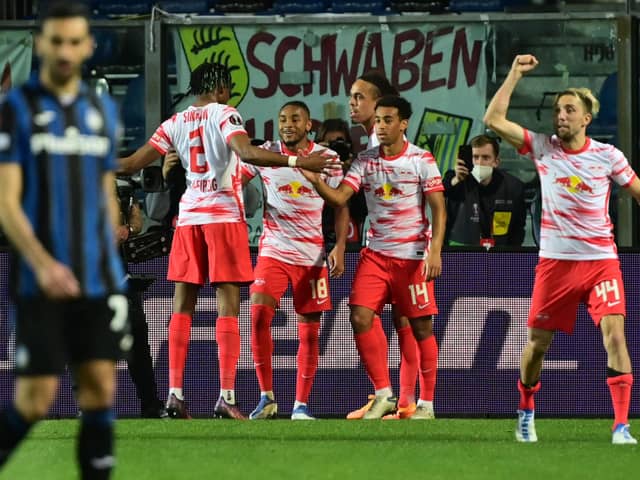 RB Leipzig's French midfielder Christopher Nkunku (3rd L Rear) celebrates after scoring a penalty during the UEFA Europa League quarter-final, second-leg football match between Atalanta and RB Leipzig at the Azzurri d'Italia stadium in Bergamo. (Photo by MIGUEL MEDINA/AFP via Getty Images)
