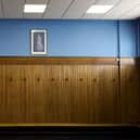 The Rangers home dressing room at Ibrox featuring a portrait of Queen Elizabeth.