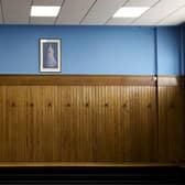 The Rangers home dressing room at Ibrox featuring a portrait of Queen Elizabeth.