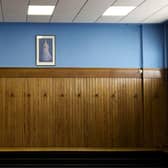 The Rangers home dressing room at Ibrox featuring a portrait of Queen Elizabeth.