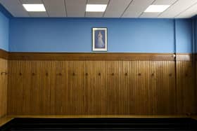 The Rangers home dressing room at Ibrox featuring a portrait of Queen Elizabeth.