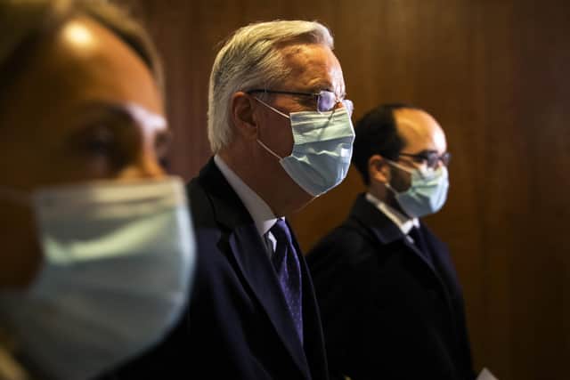 European Commission's Head of Task Force for Relations with the United Kingdom Michel Barnier, centre, arrives to the main chamber of the European Parliament in Brussels. Picture: AP Photo/Francisco Seco