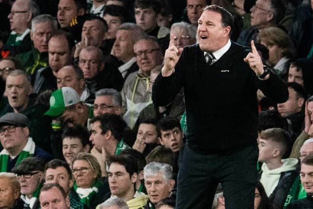 Malky Mackay's Ross County team took the lead against Celtic via a controversial penalty.