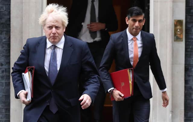 The decision by Boris Johnson and his Chancellor Rishi Sunak to cut the international aid budget was condemned by former Prime Minister David Cameron, among others (Picture: Jonathan Brady)