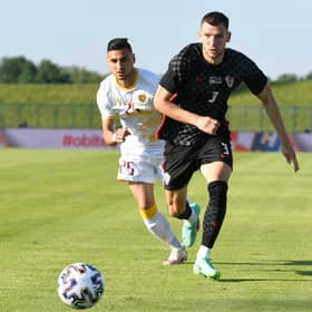 Rangers defender Borna Barisic, pictured in action in a friendly against Armenia, has established himself as Croatia's first choice left-back. (Photo by Jurij Kodrun/Getty Images)
