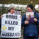 Protesters wait outside the UK Covid-19 Inquiry at Dorland House in London, where the former prime minister Boris Johnson was giving evidence.