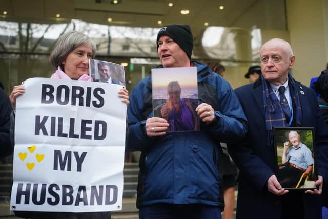 Protesters wait outside the UK Covid-19 Inquiry at Dorland House in London, where the former prime minister Boris Johnson was giving evidence.