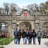 Students outside of the entrance to the Lower and Upper College Halls at the University of St Andrews. Picture: PA Media