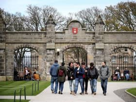 Students outside of the entrance to the Lower and Upper College Halls at the University of St Andrews. Picture: PA Media