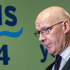 First Minister John Swinney during his visit to NHS 24 call centre in Dundee. Picture: Alan Richardson/PA Wire