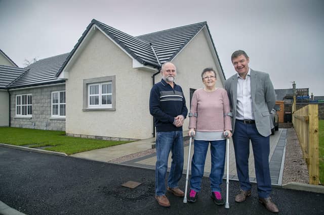 Alan and Jacqueline Scott with Allan Brown, managing director at Drumrossie Homes. (Pic: Rory Raitt)